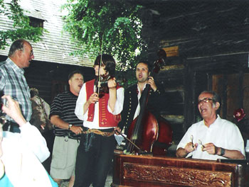 Alfred & Bobby Jones singing with a group of musicians in the Open Air Museum in Frenstat.